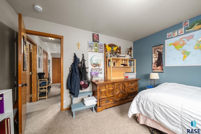 510 Kent St, Harrisburg, SD 57032 - bedroom featuring carpet flooring and a textured ceiling