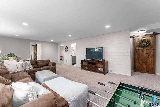 1913 S Haraldson Ave, Sioux Falls, SD 57106 - living area with a barn door, recessed lighting, and carpet floors