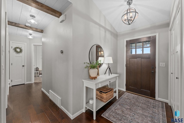 1913 S Haraldson Ave, Sioux Falls, SD 57106 - entrance foyer featuring hardwood / wood-style floors, a chandelier, and baseboards