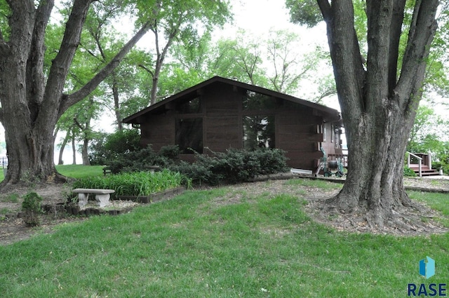 8740 Westview Rd, Brookings, SD 57006 - view of side of property featuring a yard