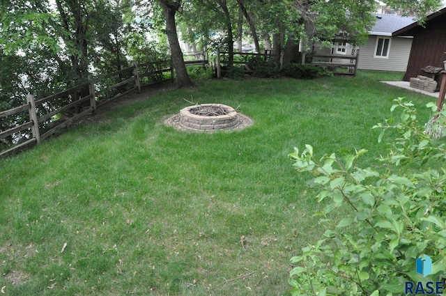 8740 Westview Rd, Brookings, SD 57006 - view of yard with an outdoor fire pit