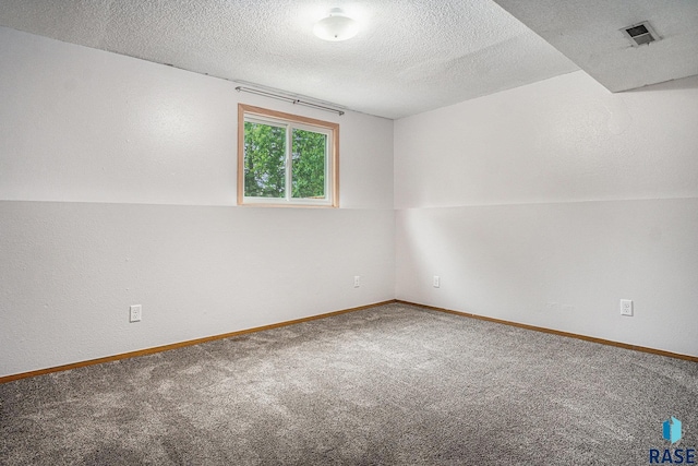 905 S Suburban Dr, Sioux Falls, SD 57110 - carpeted empty room with a textured ceiling and baseboards