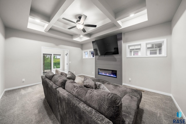9001 W Rathburn St, Sioux Falls, SD 57103 - living room with coffered ceiling, a large fireplace, carpet, beam ceiling, and baseboards