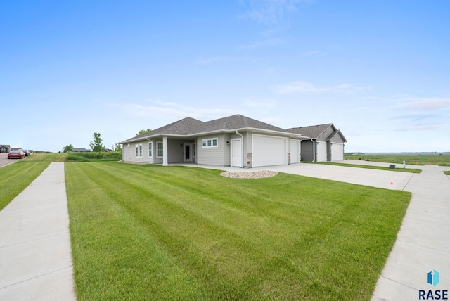 9001 W Rathburn St, Sioux Falls, SD 57103 - ranch-style home with driveway, a front lawn, and an attached garage