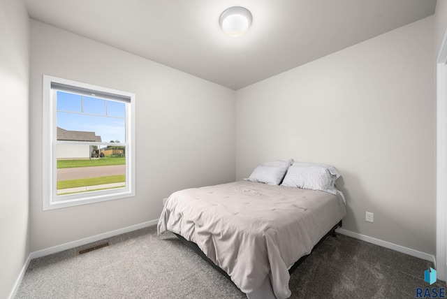 9001 W Rathburn St, Sioux Falls, SD 57103 - bedroom with carpet floors and baseboards