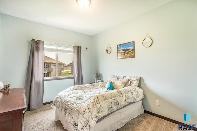 2604 S Ronell Cir, Sioux Falls, SD 57106 - carpeted bedroom featuring baseboards