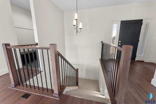 8309 E Sheridan Cir, Sioux Falls, SD 57110 - stairs with wood finished floors and baseboards