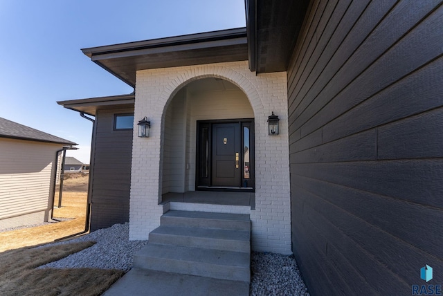 8309 E Sheridan Cir, Sioux Falls, SD 57110 - property entrance with brick siding