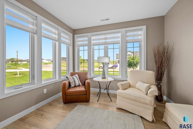 1703 N Otto Ave, Sioux Falls, SD 57110 - living area with baseboards and light wood finished floors