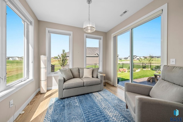 1703 N Otto Ave, Sioux Falls, SD 57110 - sunroom featuring healthy amount of natural light