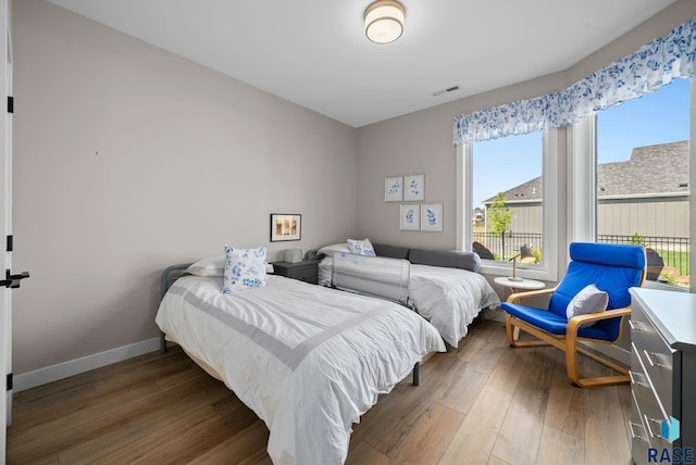 1703 N Otto Ave, Sioux Falls, SD 57110 - bedroom featuring wood finished floors and baseboards