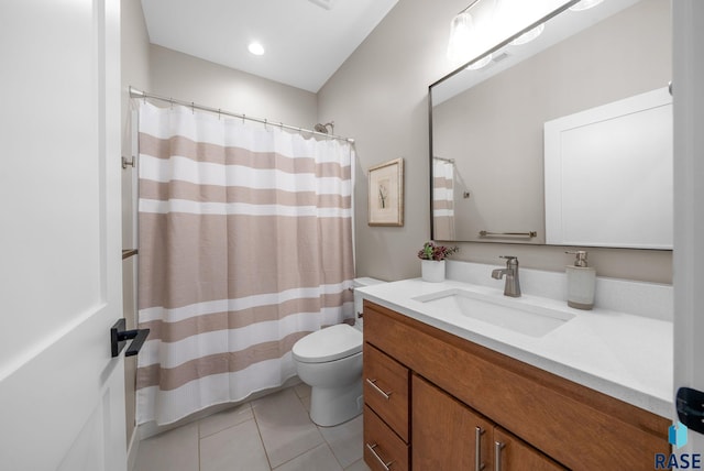 1703 N Otto Ave, Sioux Falls, SD 57110 - full bath with vanity, toilet, tile patterned flooring, and a shower with curtain