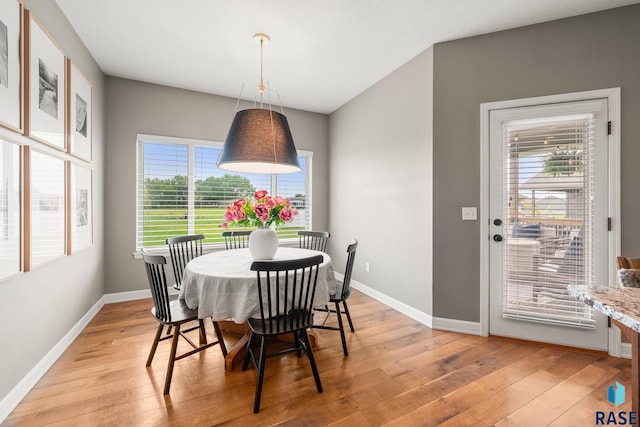 8216 W 51st St, Sioux Falls, SD 57106 - dining space featuring light wood-style flooring, healthy amount of natural light, and baseboards