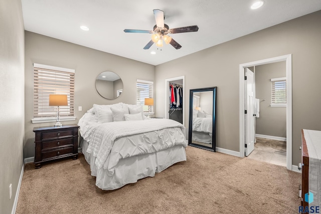 8216 W 51st St, Sioux Falls, SD 57106 - carpeted bedroom with a walk in closet, baseboards, recessed lighting, a closet, and a ceiling fan