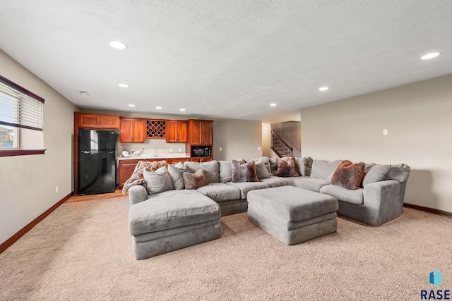 8216 W 51st St, Sioux Falls, SD 57106 - living area featuring light carpet, bar with sink, baseboards, recessed lighting, and stairway