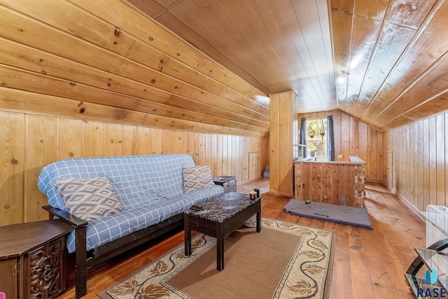 1705 W 10th St, Sioux Falls, SD 57104 - living area with wood-type flooring, wooden walls, vaulted ceiling, and wood ceiling