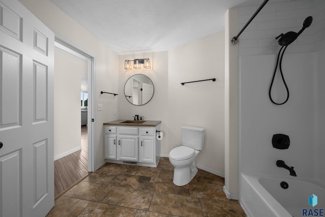 5600 W Darcie St, Sioux Falls, SD 57106 - bathroom featuring vanity, baseboards, shower / washtub combination, and toilet