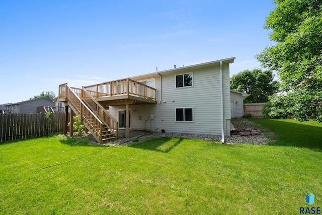 5600 W Darcie St, Sioux Falls, SD 57106 - back of house with a wooden deck and stairway