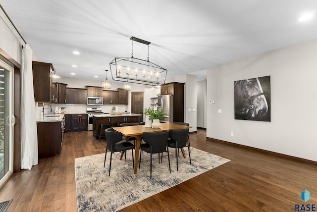 2101 S Meadowview Ave, Sioux Falls, SD 57110 - dining area with dark wood finished floors, recessed lighting, and baseboards