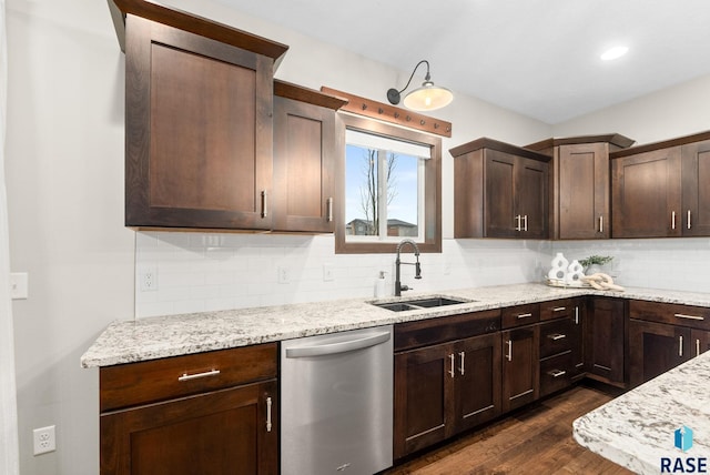 2101 S Meadowview Ave, Sioux Falls, SD 57110 - kitchen with dishwasher, a sink, dark wood-style floors, dark brown cabinetry, and tasteful backsplash