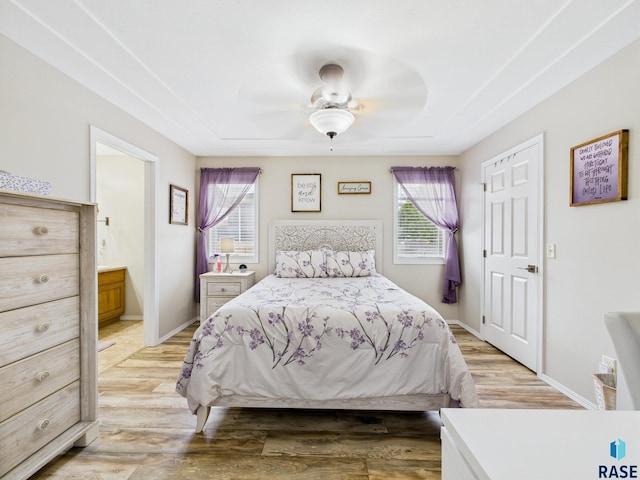 204 W Mountain Ash St, Brandon, SD 57005 - bedroom featuring light wood finished floors, ceiling fan, and ensuite bath