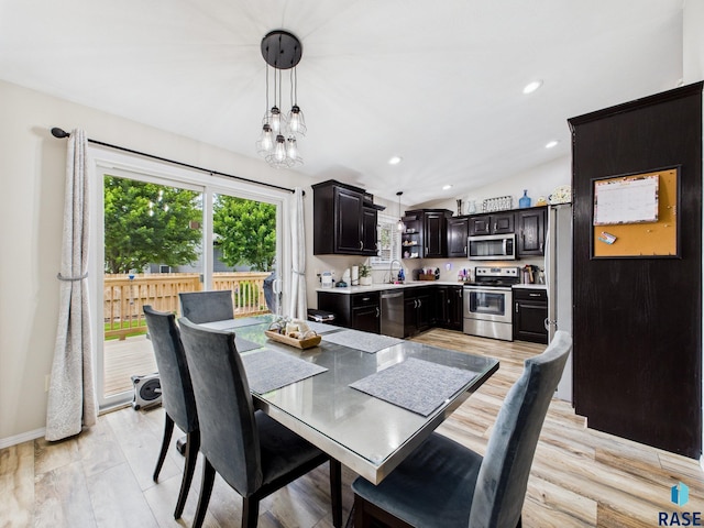 204 W Mountain Ash St, Brandon, SD 57005 - dining space with light wood-style floors, recessed lighting, and lofted ceiling