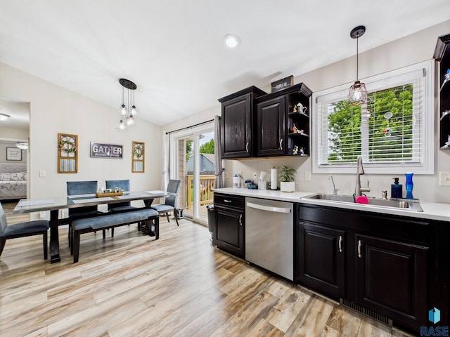 204 W Mountain Ash St, Brandon, SD 57005 - kitchen with stainless steel dishwasher, light countertops, pendant lighting, and light wood-style floors
