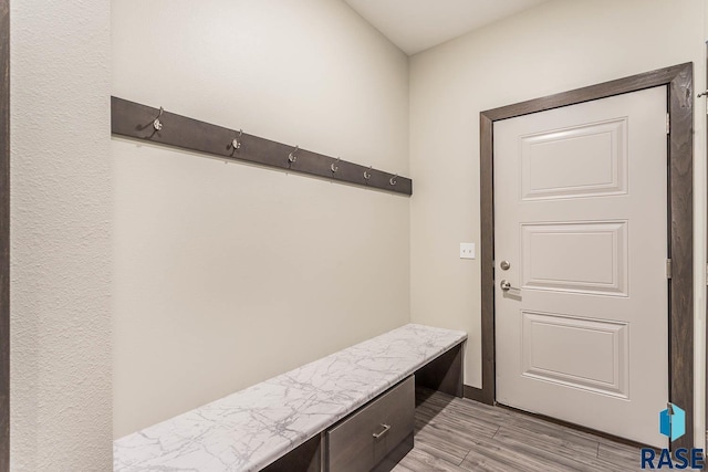 252 Devitt Dr, Harrisburg, SD 57032 - mudroom with light wood finished floors and built in desk