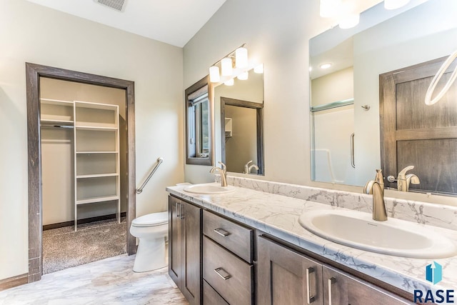 252 Devitt Dr, Harrisburg, SD 57032 - bathroom featuring double vanity and marble look tile flooring