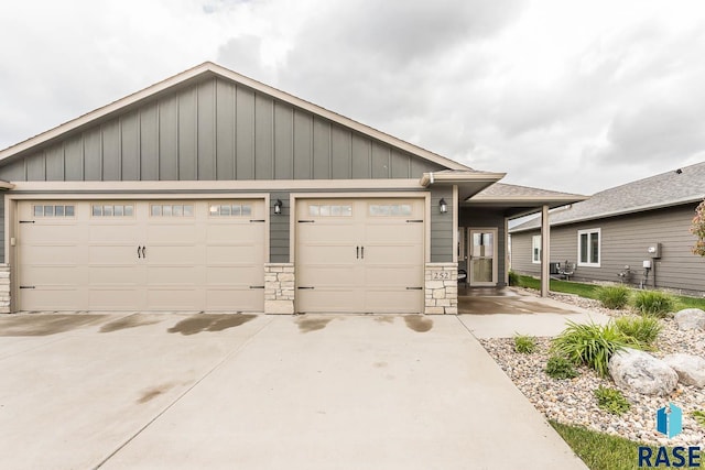 252 Devitt Dr, Harrisburg, SD 57032 - view of front facade with board and batten siding and stone siding