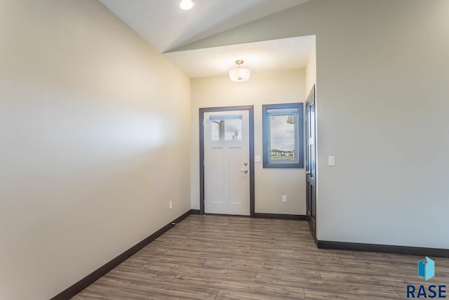 252 Devitt Dr, Harrisburg, SD 57032 - entryway with vaulted ceiling and wood finished floors