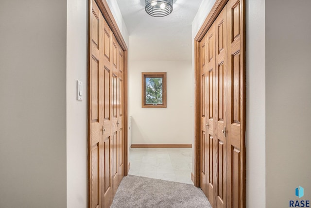 7604 E Palomino Rd, Sioux Falls, SD 57110 - hallway featuring carpet floors and baseboards