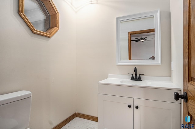 7604 E Palomino Rd, Sioux Falls, SD 57110 - half bathroom featuring vanity and marble finish floors
