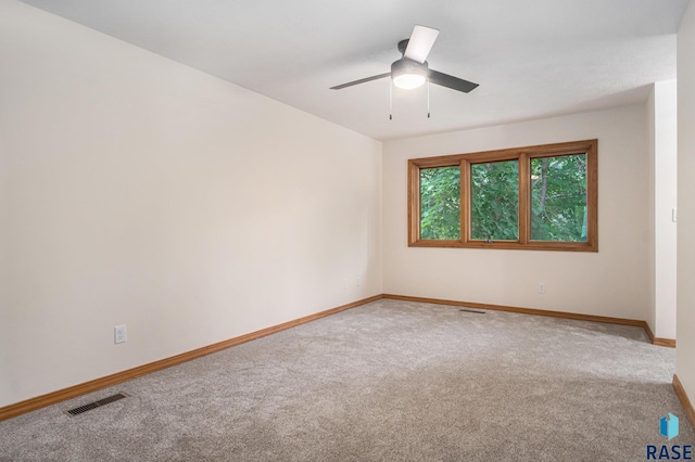 7604 E Palomino Rd, Sioux Falls, SD 57110 - spare room with carpet flooring and ceiling fan