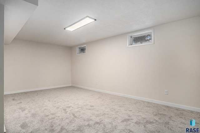 7604 E Palomino Rd, Sioux Falls, SD 57110 - finished below grade area featuring carpet flooring and baseboards