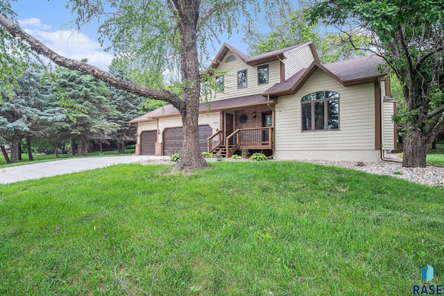 7604 E Palomino Rd, Sioux Falls, SD 57110 - view of front facade with concrete driveway, a front lawn, covered porch, and a garage