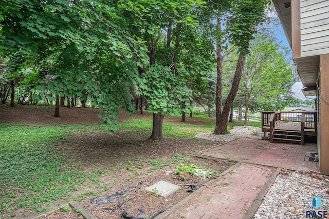 7604 E Palomino Rd, Sioux Falls, SD 57110 - view of yard with a deck