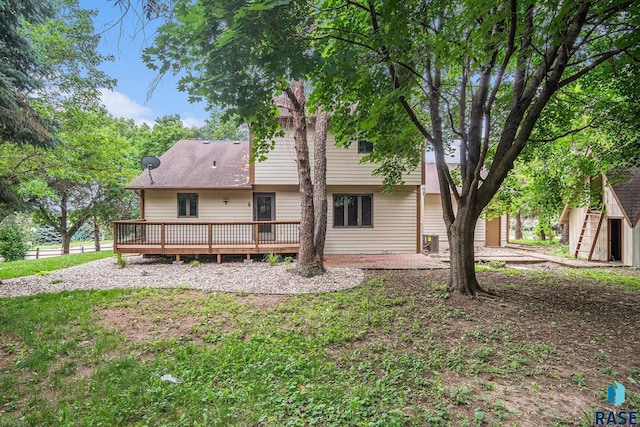 7604 E Palomino Rd, Sioux Falls, SD 57110 - rear view of house with a deck