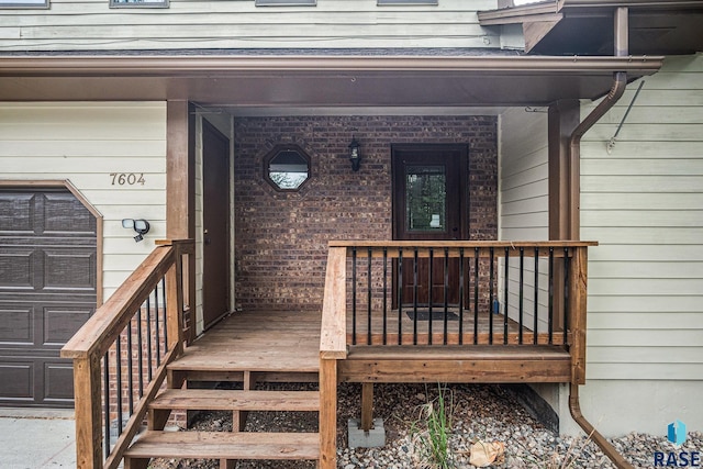 7604 E Palomino Rd, Sioux Falls, SD 57110 - view of exterior entry with a porch and brick siding
