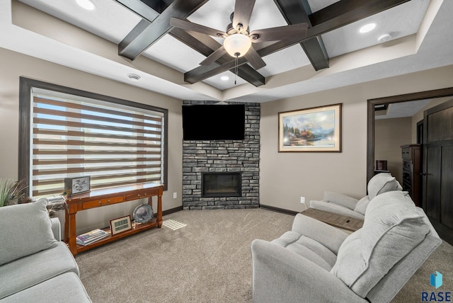 217 E Antioch St, Tea, SD 57064 - living area featuring coffered ceiling, carpet floors, a stone fireplace, beam ceiling, and ceiling fan