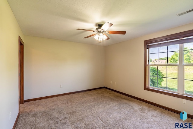 5509 E Eastbridge Pl, Sioux Falls, SD 57110 - spare room with carpet floors and ceiling fan