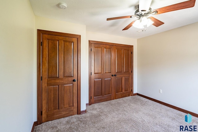 5509 E Eastbridge Pl, Sioux Falls, SD 57110 - unfurnished bedroom with carpet floors, a closet, and a ceiling fan