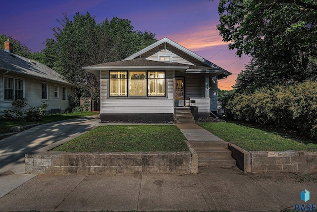 229 N Trapp Ave, Sioux Falls, SD 57104 - view of front of property with a yard and a porch