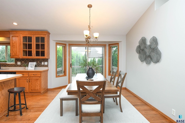 6312 S Heatherridge Ave, Sioux Falls, SD 57108 - dining room featuring plenty of natural light, a chandelier, light wood-style flooring, and recessed lighting