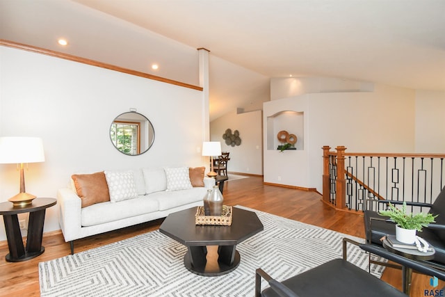 6312 S Heatherridge Ave, Sioux Falls, SD 57108 - living area featuring wood finished floors, vaulted ceiling, and recessed lighting