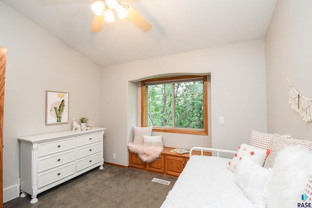 6312 S Heatherridge Ave, Sioux Falls, SD 57108 - bedroom with dark carpet, a ceiling fan, and vaulted ceiling