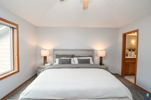 6312 S Heatherridge Ave, Sioux Falls, SD 57108 - bedroom featuring carpet floors, ensuite bath, and a ceiling fan