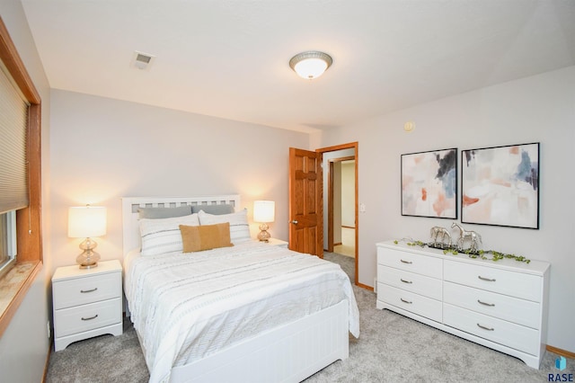 6312 S Heatherridge Ave, Sioux Falls, SD 57108 - bedroom with light carpet and baseboards