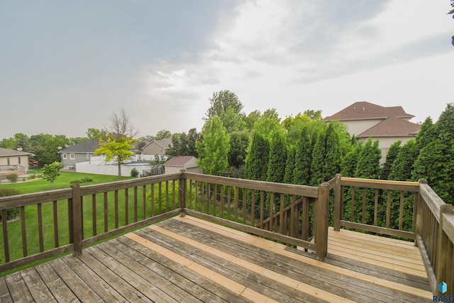 6312 S Heatherridge Ave, Sioux Falls, SD 57108 - wooden terrace featuring a yard and a residential view