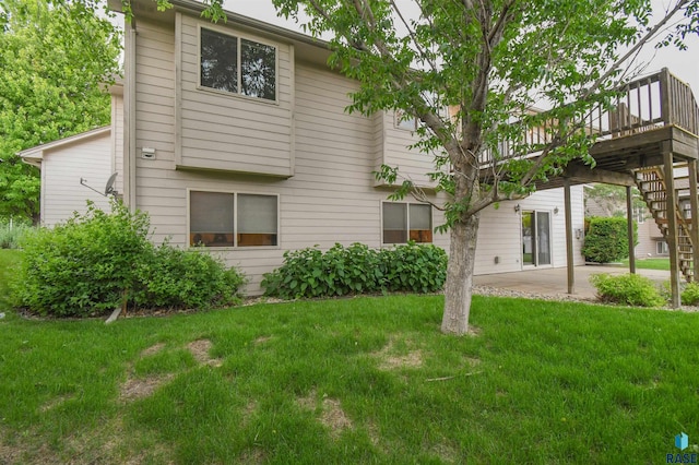 6312 S Heatherridge Ave, Sioux Falls, SD 57108 - back of house with a deck, a patio, a lawn, and stairway